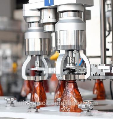 AC380V Glass Bottle Capping Machine 6000BPH With Four Claws Structure